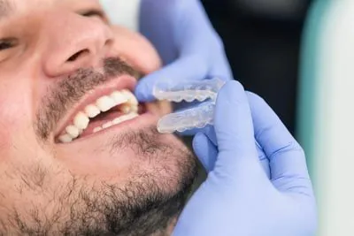 Evergreen Smile Studio patient getting fitted for Invisalign clear aligners