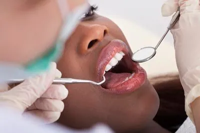 patient being checked for sensitive teeth at Evergreen Smile Studio