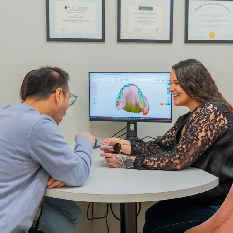 patient reviewing a 3D dental scan at Evergreen Smile Studio in Seattle, WA